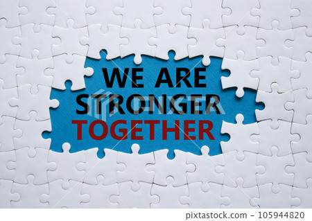 We are stronger together symbol. White puzzle with words We are stronger together. Beautiful blue background. We are stronger together concept. Copy space. We are stronger together symbol. White puzzle with words We are stronger together. Beautiful blue background. We are stronger together concept. Copy space. 105944820