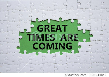 Great times are coming symbol. Concept words Great times are coming on white puzzle. Beautiful green background. Business and Great times are coming concept. Copy space. 105944842