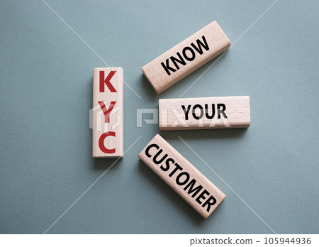 KYC - Know Your Customer. Wooden cubes with word KYC. Beautiful grey green background. Business and Know Your Customer concept. Copy space KYC - Know Your Customer. Wooden cubes with word KYC. Beautiful grey green background. Business and Know Your Customer concept. Copy space 105944936