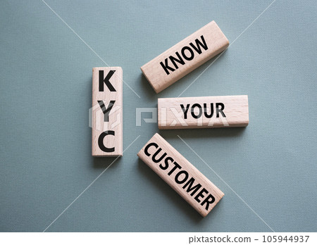 KYC - Know Your Customer. Wooden cubes with word KYC. Beautiful grey green background. Business and Know Your Customer concept. Copy space KYC - Know Your Customer. Wooden cubes with word KYC. Beautiful grey green background. Business and Know Your Customer concept. Copy space 105944937