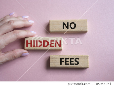 No Hidden Fees symbol. Concept words No Hidden Fees on wooden blocks. Businessman hand. Beautiful pink background. Business and No Hidden Fees concept. Copy space. 105944961