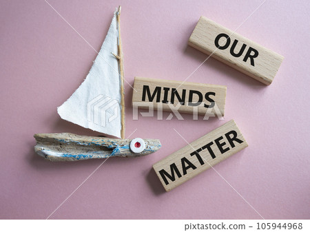Our Minds Matter symbol. Concept words Our Minds Matter on wooden blocks. Beautiful pink background with boat. Psychological social and Our Minds Matter concept. Copy space. Our Minds Matter symbol. Concept words Our Minds Matter on wooden blocks. Beautiful pink background with boat. Psychological social and Our Minds Matter concept. Copy space. 105944968