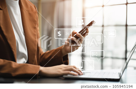 Hand using smart phone, mobile p payments online shopping, omni channel, digital tablet docking keyboard computer. Hand using smart phone, mobile p payments online shopping, omni channel, digital tablet docking keyboard computer. 105945194