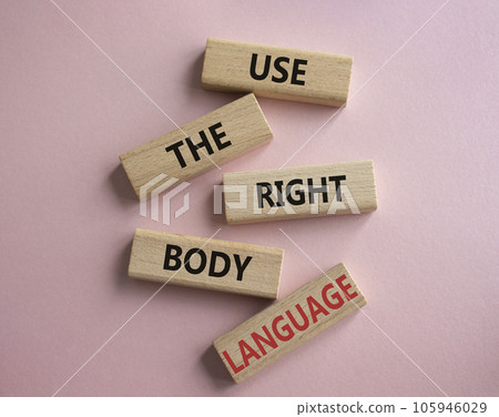 Use the righ Body Language symbol. Concept words Use the righ Body Language on wooden blocks. Beautiful pink background. Business concept. Copy space Use the righ Body Language symbol. Concept words Use the righ Body Language on wooden blocks. Beautiful pink background. Business concept. Copy space 105946029