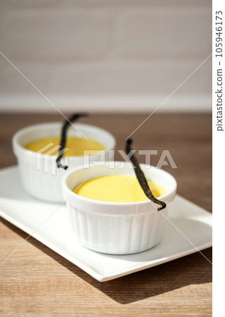 Homemade vanilla custard on wooden table 105946173