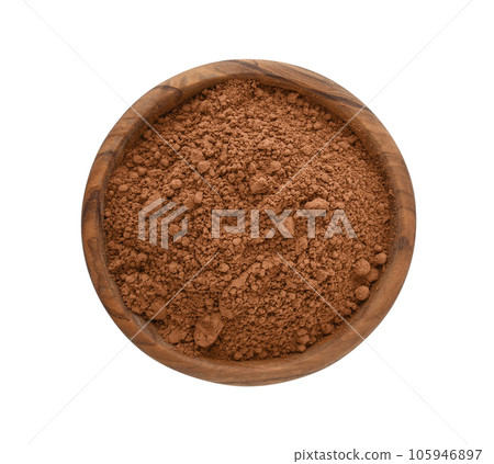 Cocoa powder in wooden bowl Cocoa powder in wooden bowl 105946897