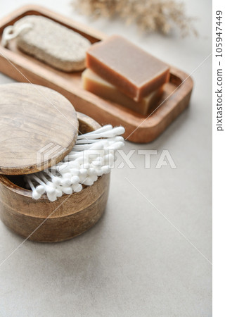 Cotton buds in wooden box Cotton buds in wooden box 105947449
