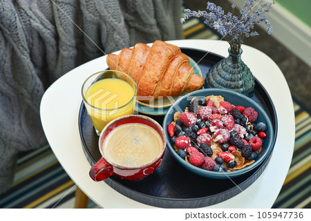 Healthy breakfast with berries Healthy breakfast with berries 105947736