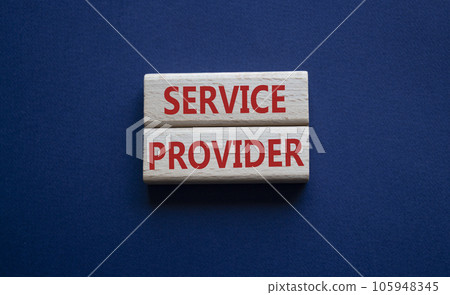 Service Provider symbol. Concept words Service Provider on wooden blocks. Beautiful deep blue background. Business and Service Provider concept. Copy space. 105948345