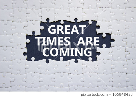 Great times are coming symbol. Concept words Great times are coming on white puzzle. Beautiful black background. Business and Great times are coming concept. Copy space. Great times are coming symbol. Concept words Great times are coming on white puzzle. Beautiful black background. Business and Great times are coming concept. Copy space. 105948453