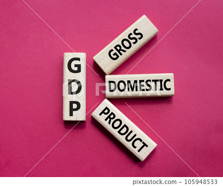 GDP - Gross domestic product symbol. Concept word GDP on wooden cubes. Beautiful red background. Business and GDP concept. Copy space. 105948533