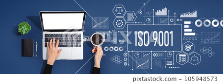 ISO 9001 theme with person using laptop computer 105948573