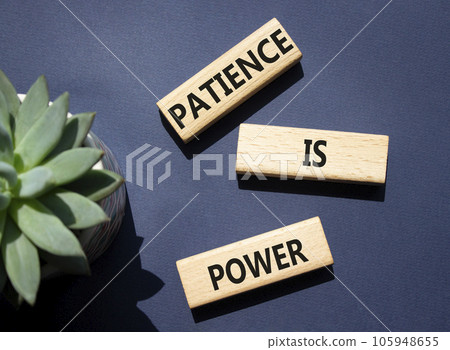 Patience is Power symbol. Concept words Patience is Power on wooden blocks. Beautiful deep blue background. Business and Patience is Power concept. Copy space. 105948655