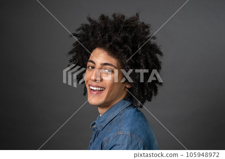 Contented smiling guy looking happy and pleased Contented smiling guy looking happy and pleased 105948972