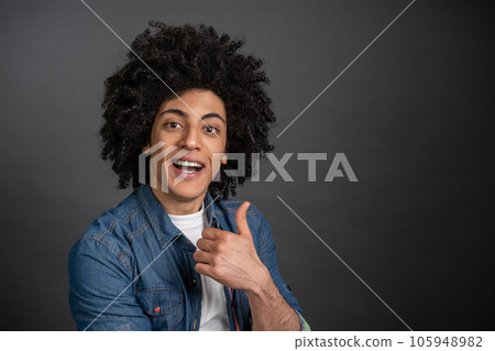 Contented smiling guy looking happy and pleased 105948982