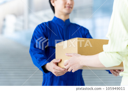 Staff delivering packages Staff delivering packages 105949011