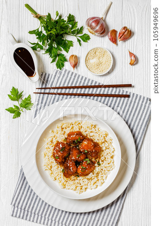 Baked Honey Sesame Chicken with brown rice 105949696