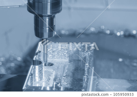The CNC milling machine rough cutting the aluminum housing with flat end mill tool. The CNC milling machine rough cutting the aluminum housing with flat end mill tool. 105950933