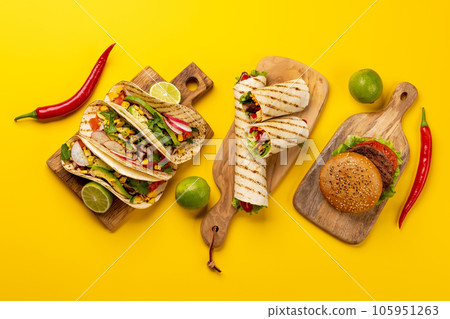 Mexican food featuring tacos, burritos, nachos, burgers 105951263