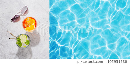 Refreshing cocktail by the pool on a sunny day 105951386