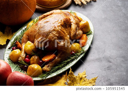 Thanksgiving turkey on rustic table Thanksgiving turkey on rustic table 105951545