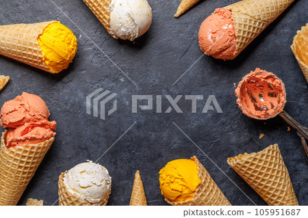 Assorted ice cream flavours in delightful waffle cones 105951687