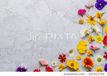 Assorted flowers on marble backdrop 105951700
