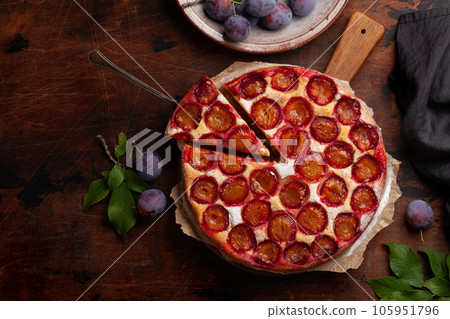 Homemade plum pie. Fruit tart with seasonal fruits 105951796