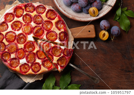 Homemade plum pie. Fruit tart with seasonal fruits Homemade plum pie. Fruit tart with seasonal fruits 105951797