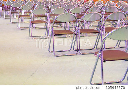 Many pipe chairs lined up 105952570