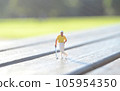 A miniature of a man playing golf A miniature of a man playing golf 105954350