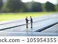 Miniature of businessman shaking hands Miniature of businessman shaking hands 105954355