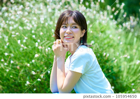 Woman relaxing in green space 105954650