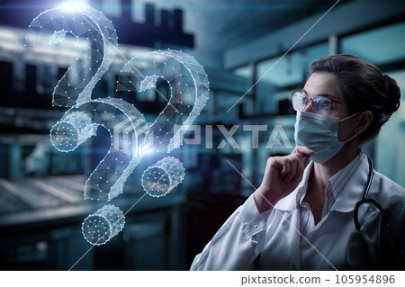 A laboratory assistant is looking for an answer to questions. A laboratory assistant is looking for an answer to questions. 105954896