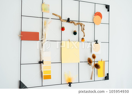 Side view grid mood board with fall colors palette notes and mockups, seasonal natural decor like dried flowers. Autumn inspiration and cozy hygge mood with copy space. Gradient of warm fall shades 105954930