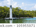 A small white lighthouse in Naples Florida 105955071