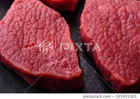 Juicy fresh raw beef meat with salt, spices and herbs 105955365