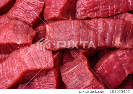 Juicy fresh raw beef meat with salt, spices and herbs Juicy fresh raw beef meat with salt, spices and herbs 105955405