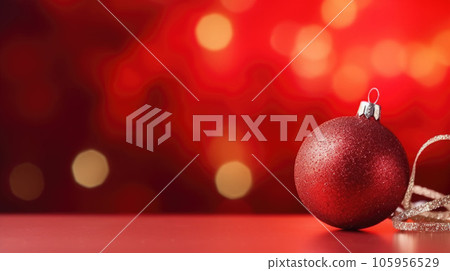 Red Christmas baubles decoration on red blurred background with lights. New Year greeting card. Minimal style. AI generated 105956529