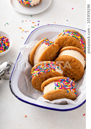 Ice cream and cookies sandwiches stacked on the table 105959296