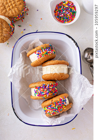 Ice cream and cookies sandwiches stacked on the table 105959297