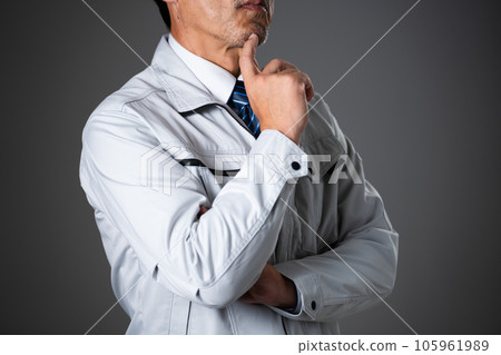Worried middle-aged man Work clothes image 105961989