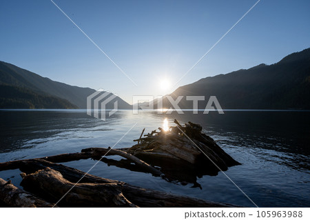 Tranquil summer sunset on Lake Crescent in Olympic National Park, Washington. Tranquil summer sunset on Lake Crescent in Olympic National Park, Washington. 105963988