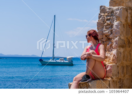 Old Venetian fort. Ruins of old medieval castle on mediterranean sea. Kastelina castle Vir island 105964407