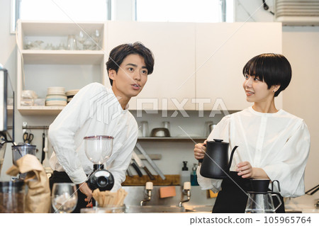 Staff working at a cafe Staff working at a cafe 105965764