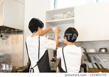 Staff working at a cafe Staff working at a cafe 105965770