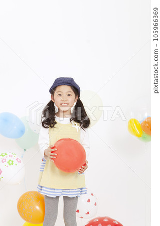A girl with a balloon 105966369