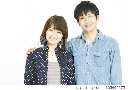 A couple of cuddling smiles A couple of cuddling smiles 105966375