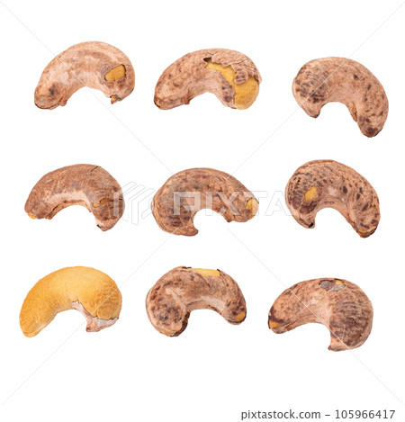 Roasted cashew nuts isolated on a white background. 105966417