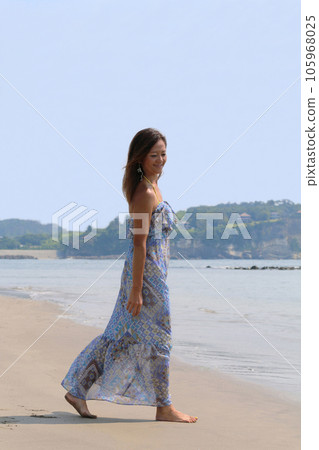 Sea and blue sky and women Sea and blue sky and women 105968025